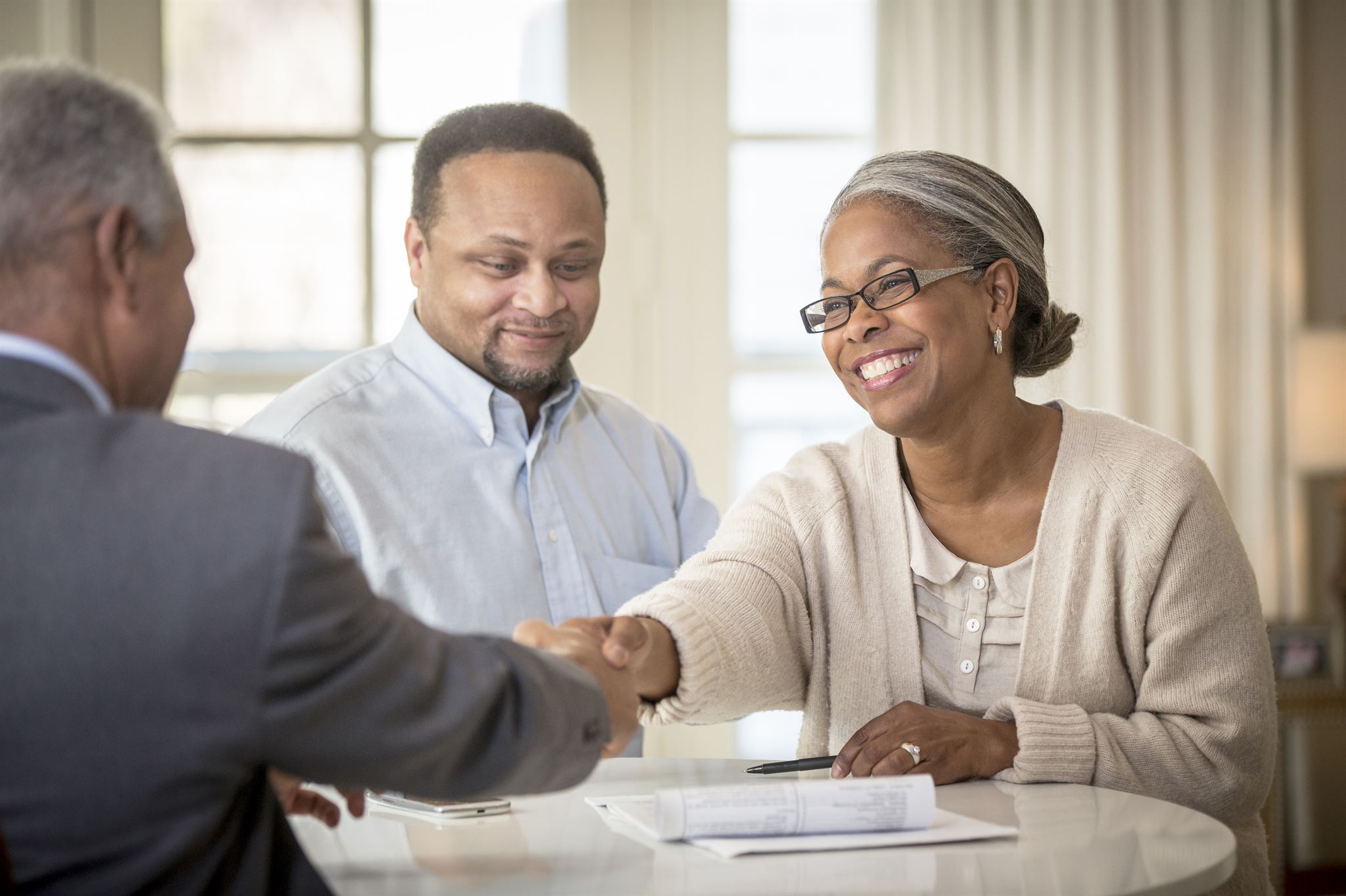 Advisor and client handshake
